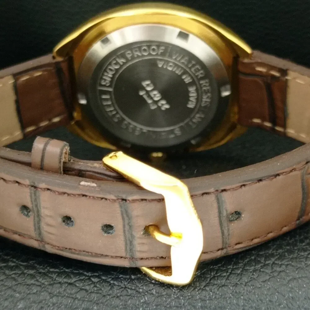 Vintage 1976 HMT Automatic Wound Mens Gold Watch W/daydate & Red accents